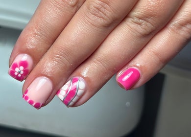 Pink floral nail art design at Nails and Beauty by Sarah in Huddersfield, England, GB.
