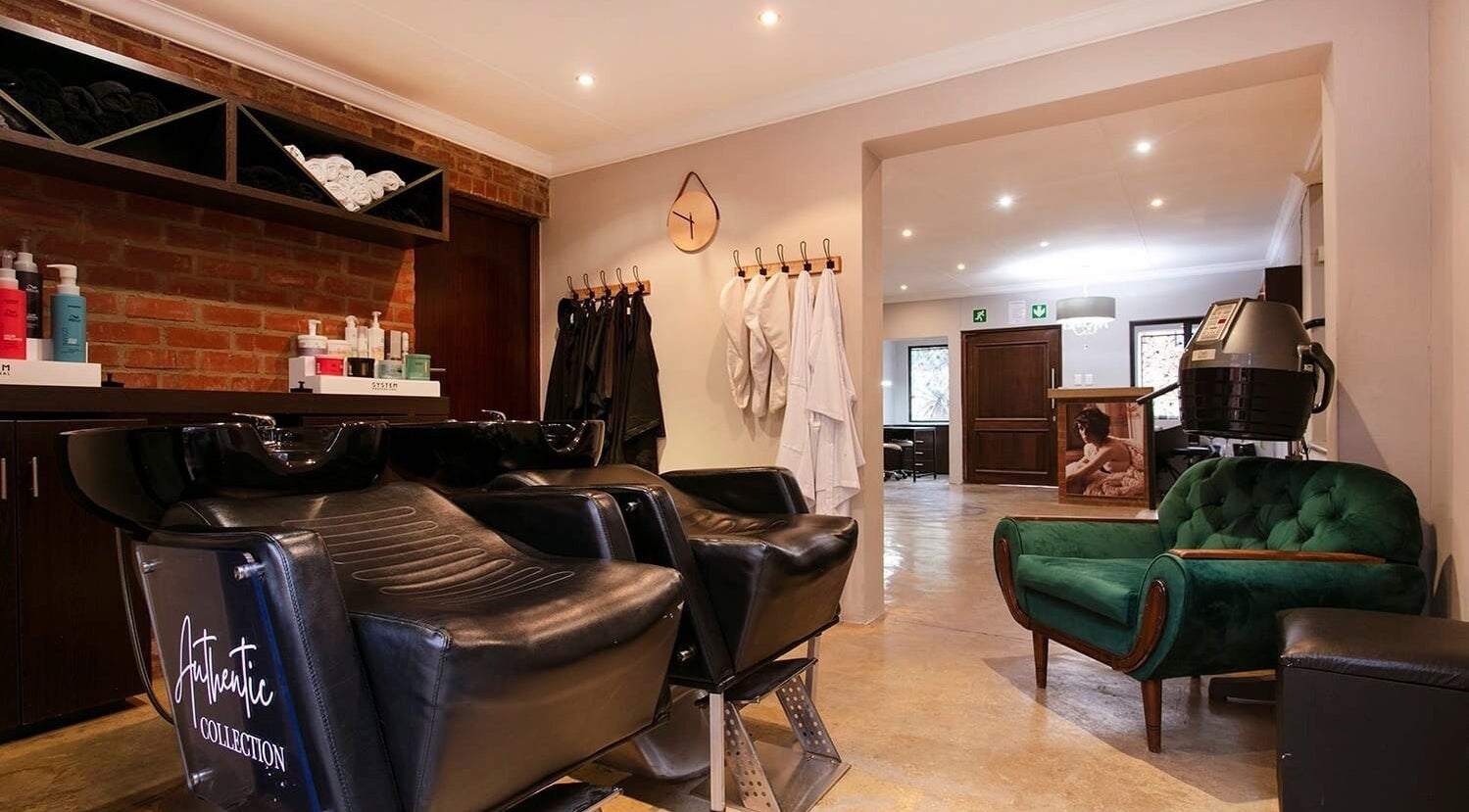 Stylish salon chairs at Authentic Collection in Pretoria, Gauteng, ZA offer a relaxing beauty experience.