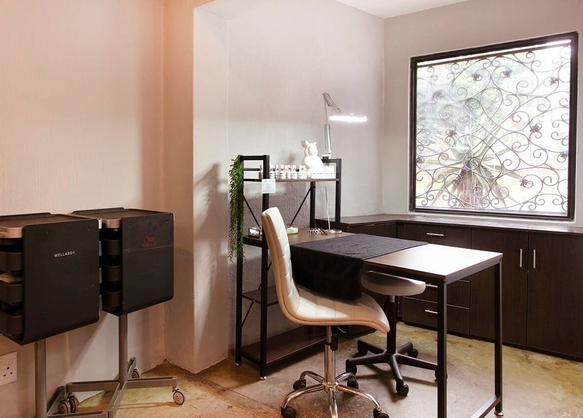 Elegant nail station at Authentic Collection, Pretoria, Gauteng, ZA with natural lighting and stylish decor.