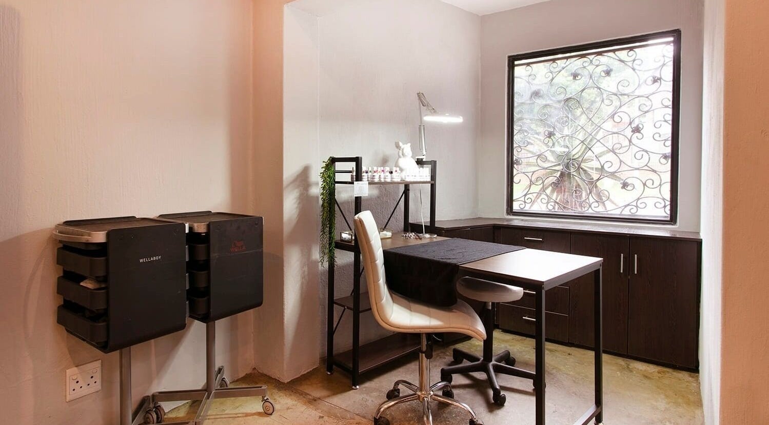 Elegant nail station at Authentic Collection, Pretoria, Gauteng, ZA with natural lighting and stylish decor.