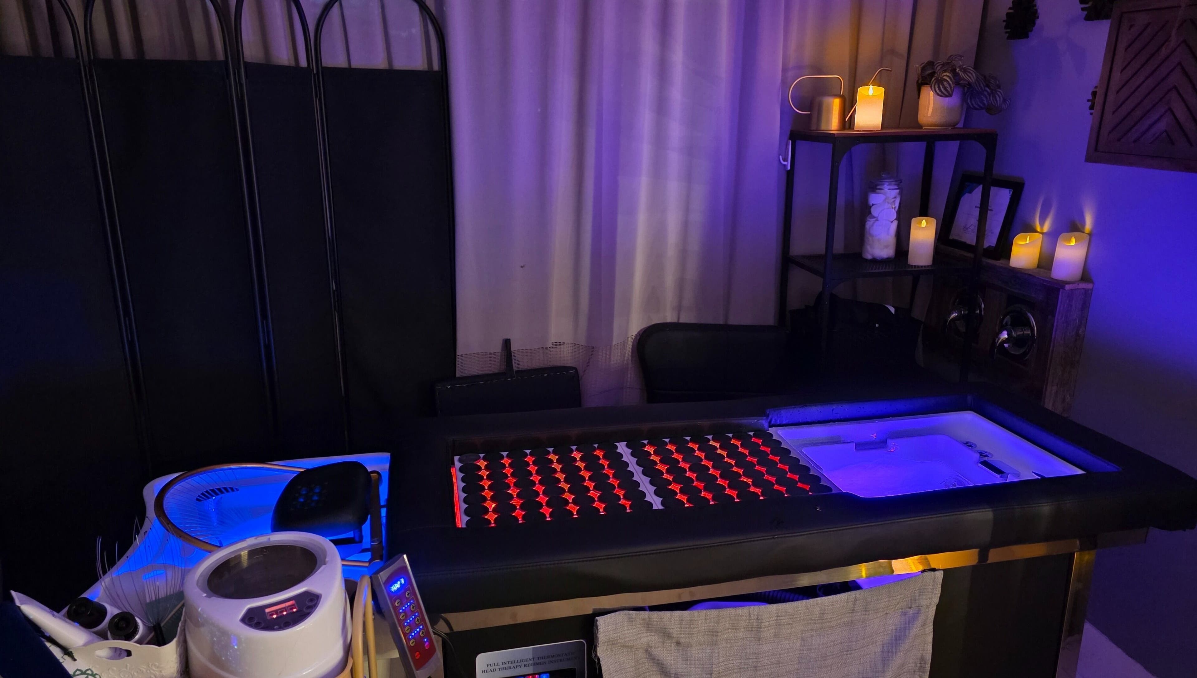 Luxurious spa setup at Ice and Glow Beauty and Wellness Center LLC, Ft Worth, Texas, US, with ambient lighting.