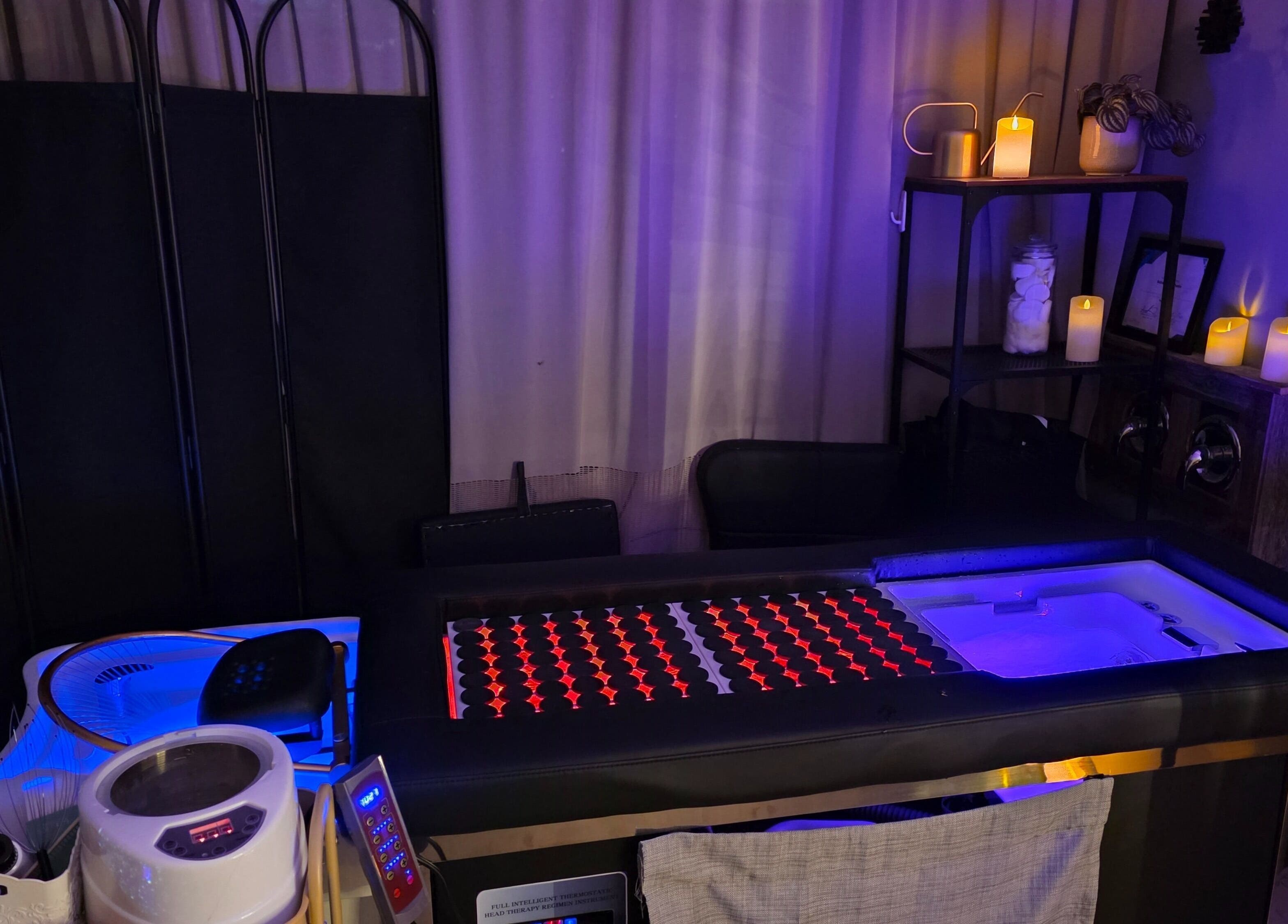 Luxurious spa setup at Ice and Glow Beauty and Wellness Center LLC, Ft Worth, Texas, US, with ambient lighting.
