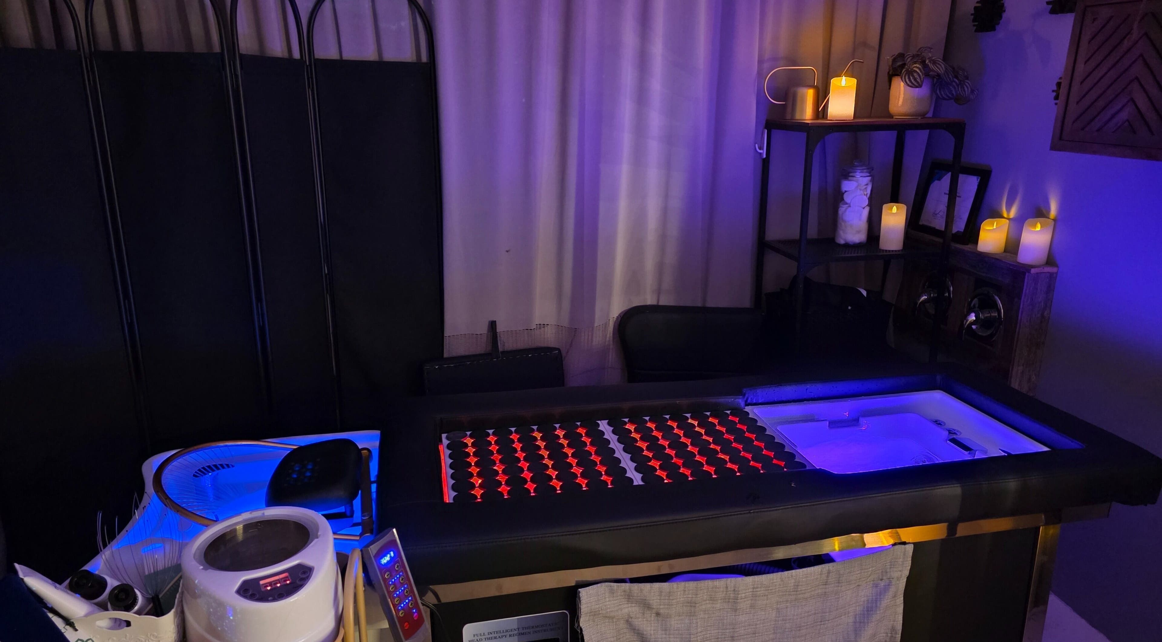 Luxurious spa setup at Ice and Glow Beauty and Wellness Center LLC, Ft Worth, Texas, US, with ambient lighting.