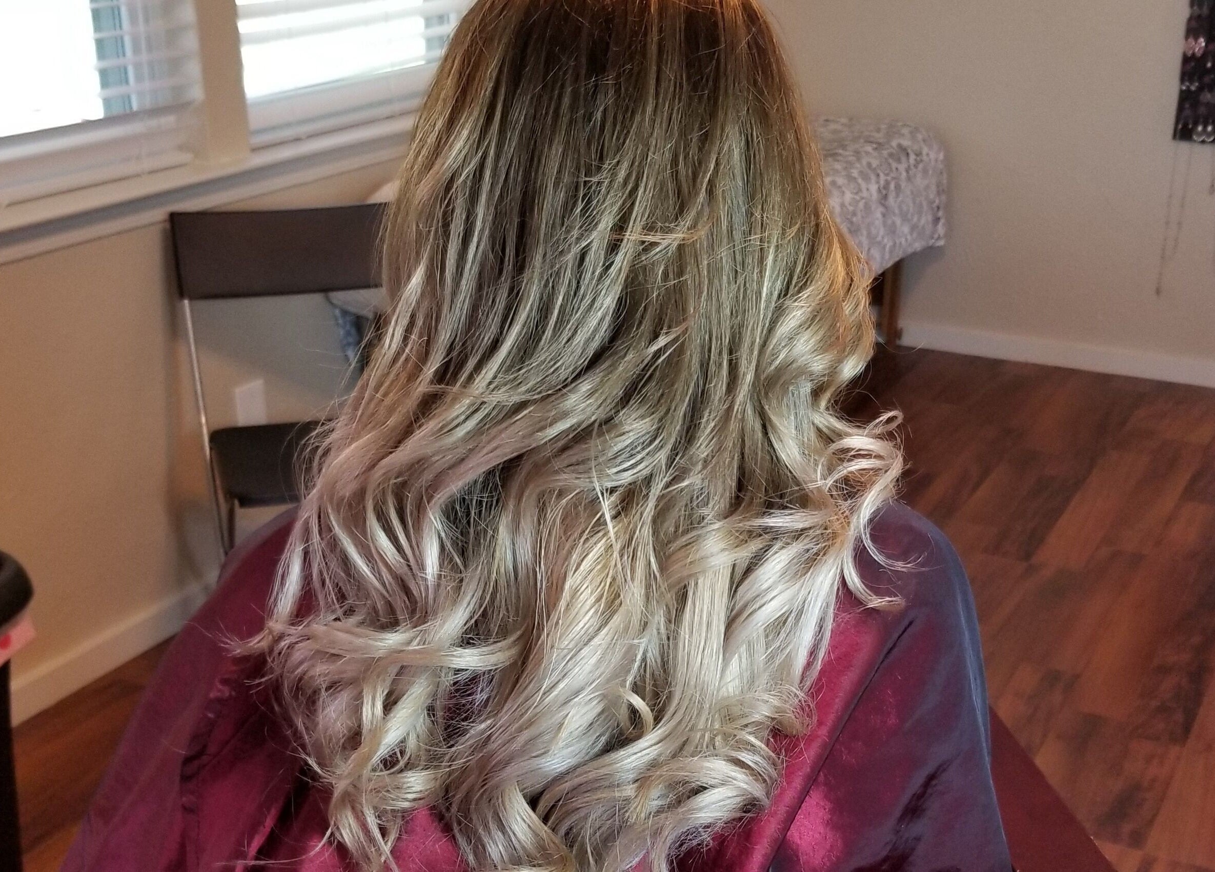 Close-up of styled hair waves at Ice and Glow Beauty and Wellness Center LLC, Ft Worth, Texas, US.