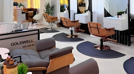 Modern interior of Off White Salon & Spa in Abu Dhabi, AE featuring stylish salon chairs and mirrors.