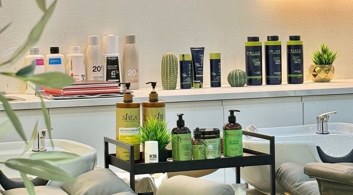 Shelf with beauty products at Off White Salon & Spa, Abu Dhabi, AE.