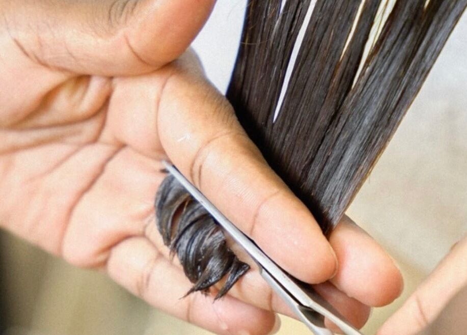 Precision haircut at Off White Salon & Spa, Abu Dhabi, AE showcasing expert styling.