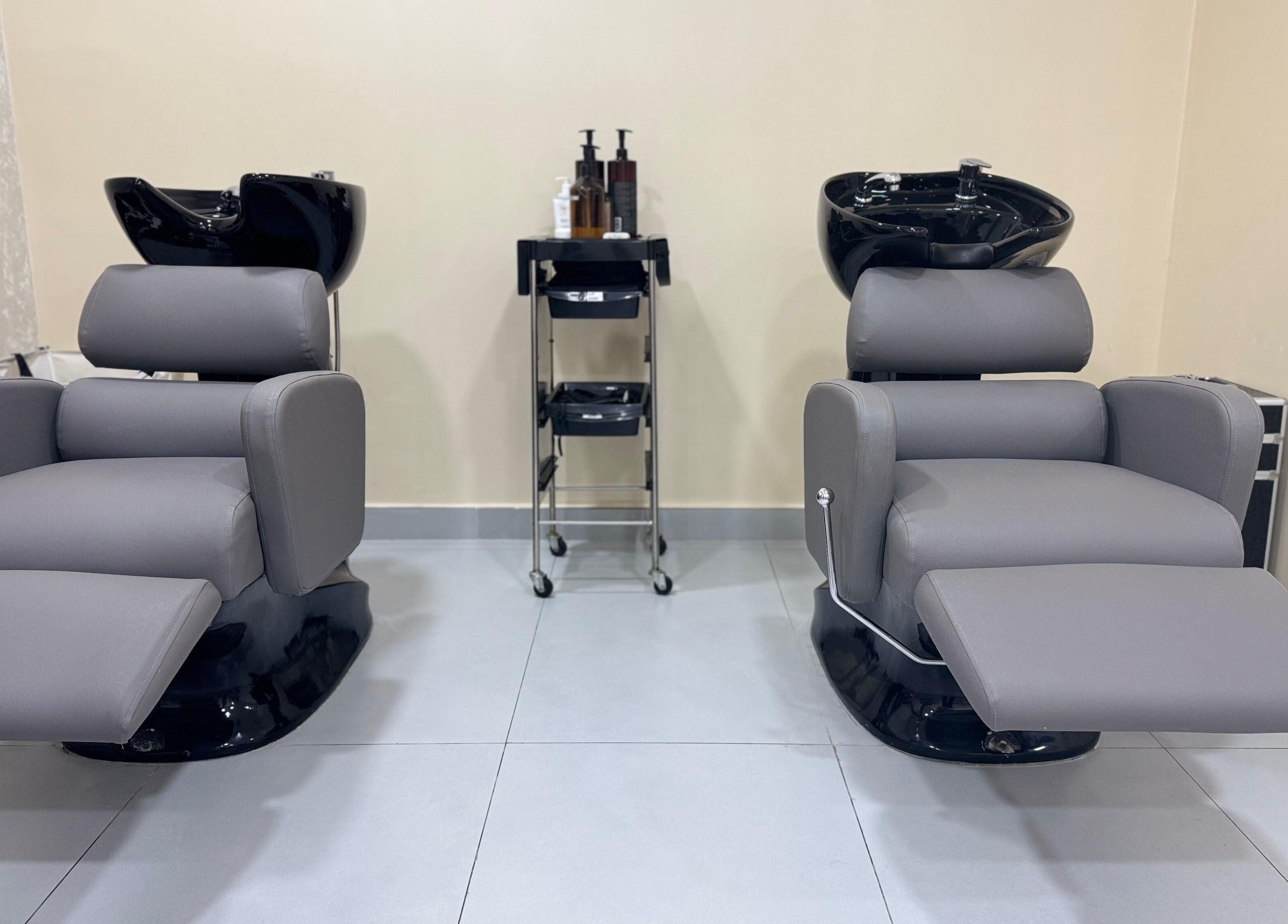 Luxurious wash stations at Moora Beauty Salon, Dubai, Dubai, AE, offering premium hair care services.