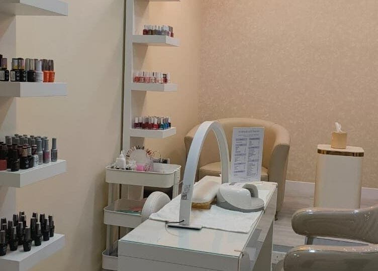 Moora Beauty Salon interior with nail polish racks in Dubai, Dubai, AE.