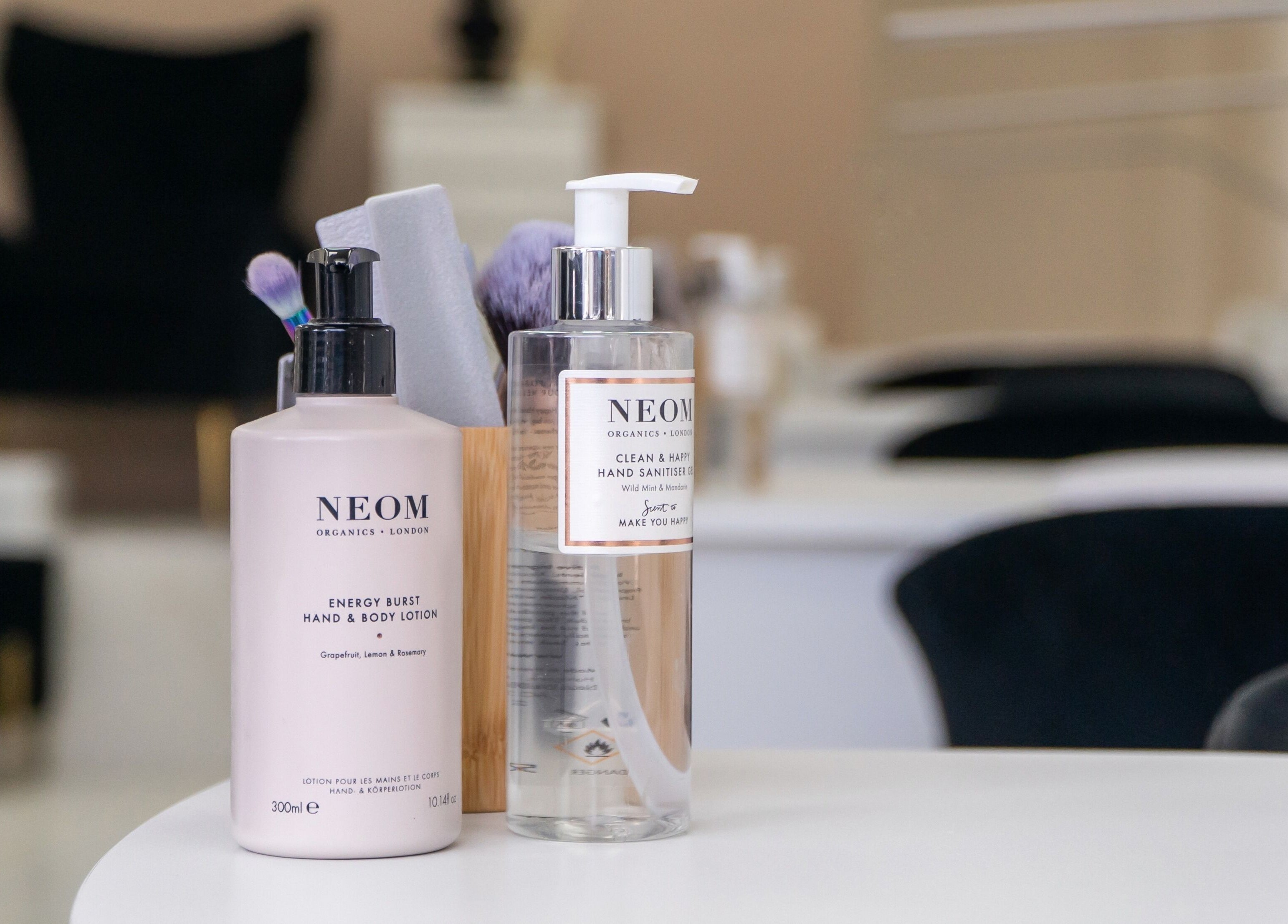 Neom lotion and sanitizer on a table at Josie & Co, Lytham St Annes, England, GB.