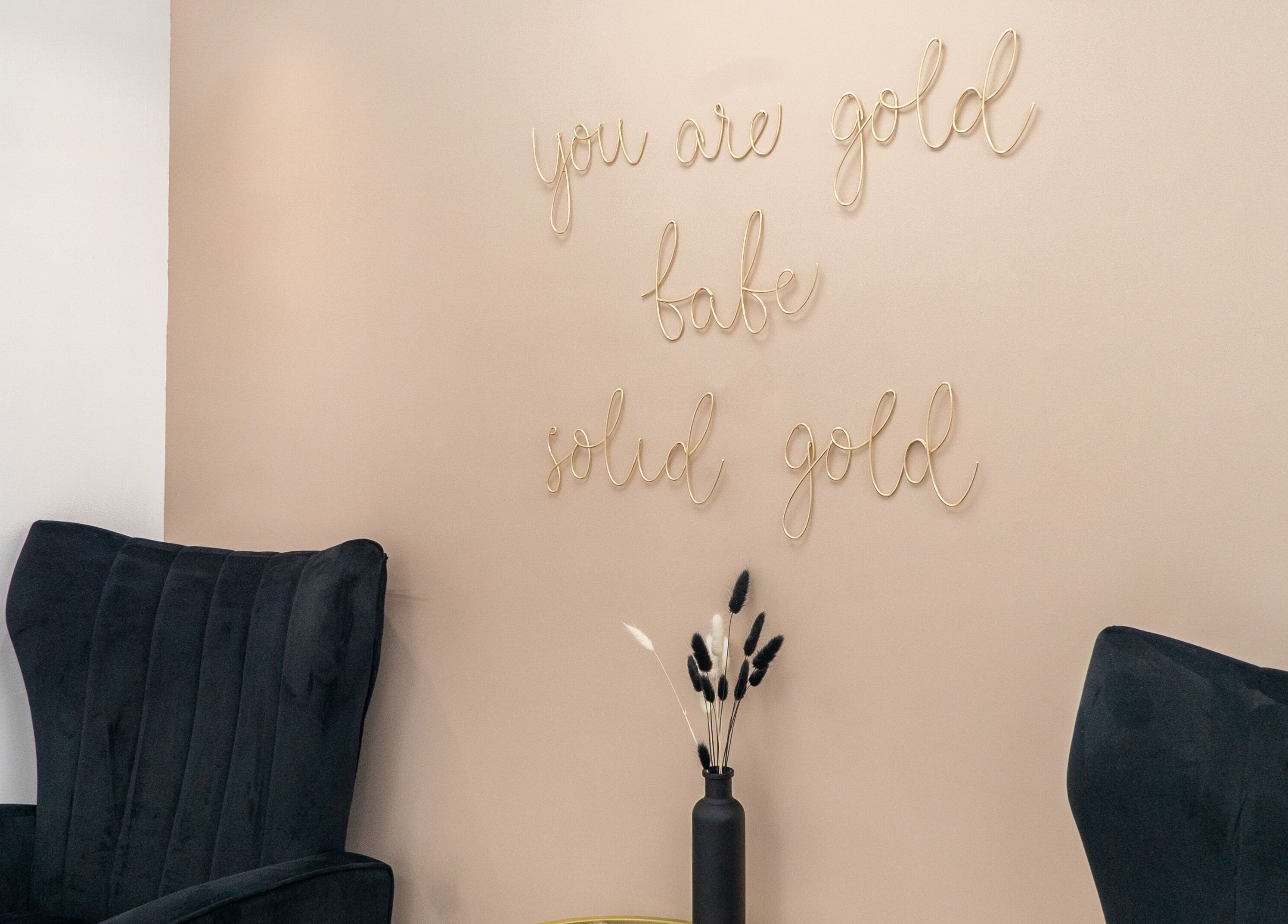 Stylish lounge with 'You Are Gold' decor at Josie & Co, Lytham St Annes, England, GB.