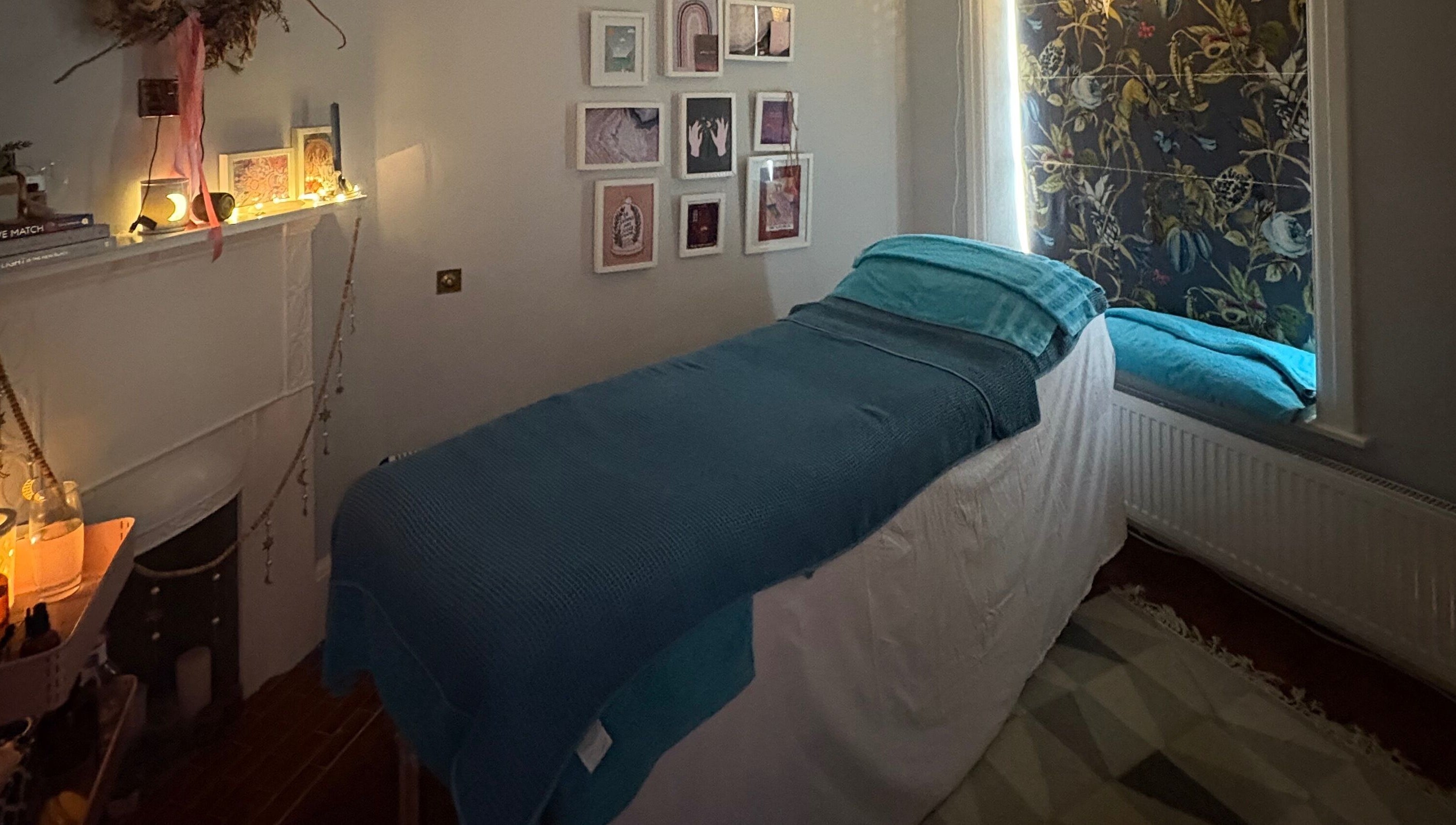 Cozy treatment room at EOS Wellness Treatments, Harrogate, England, GB with calming decor and soft lighting.