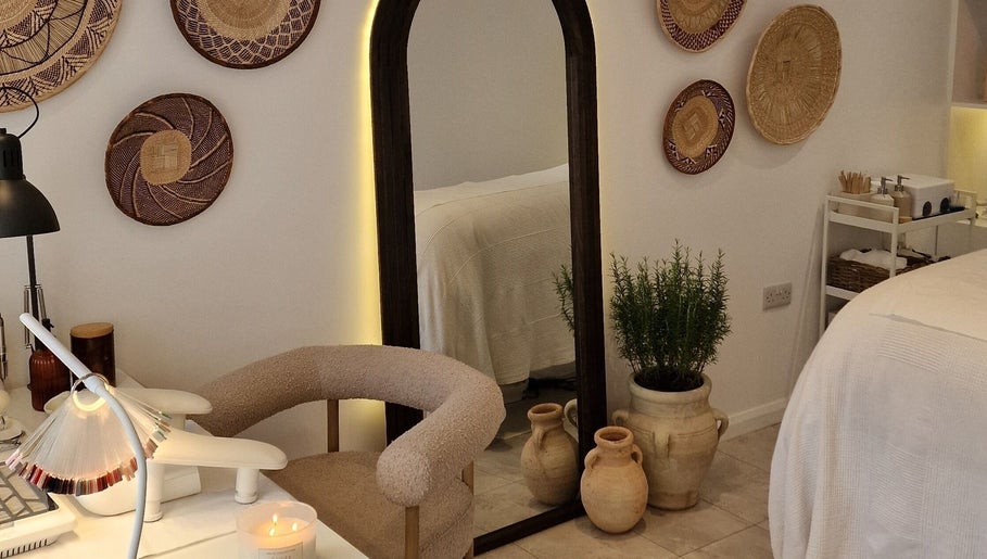 Rustic decor and cozy seating at Klae Beauty, Camberley, England, GB. Relaxing and inviting ambiance.