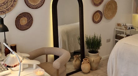 Rustic decor and cozy seating at Klae Beauty, Camberley, England, GB. Relaxing and inviting ambiance.