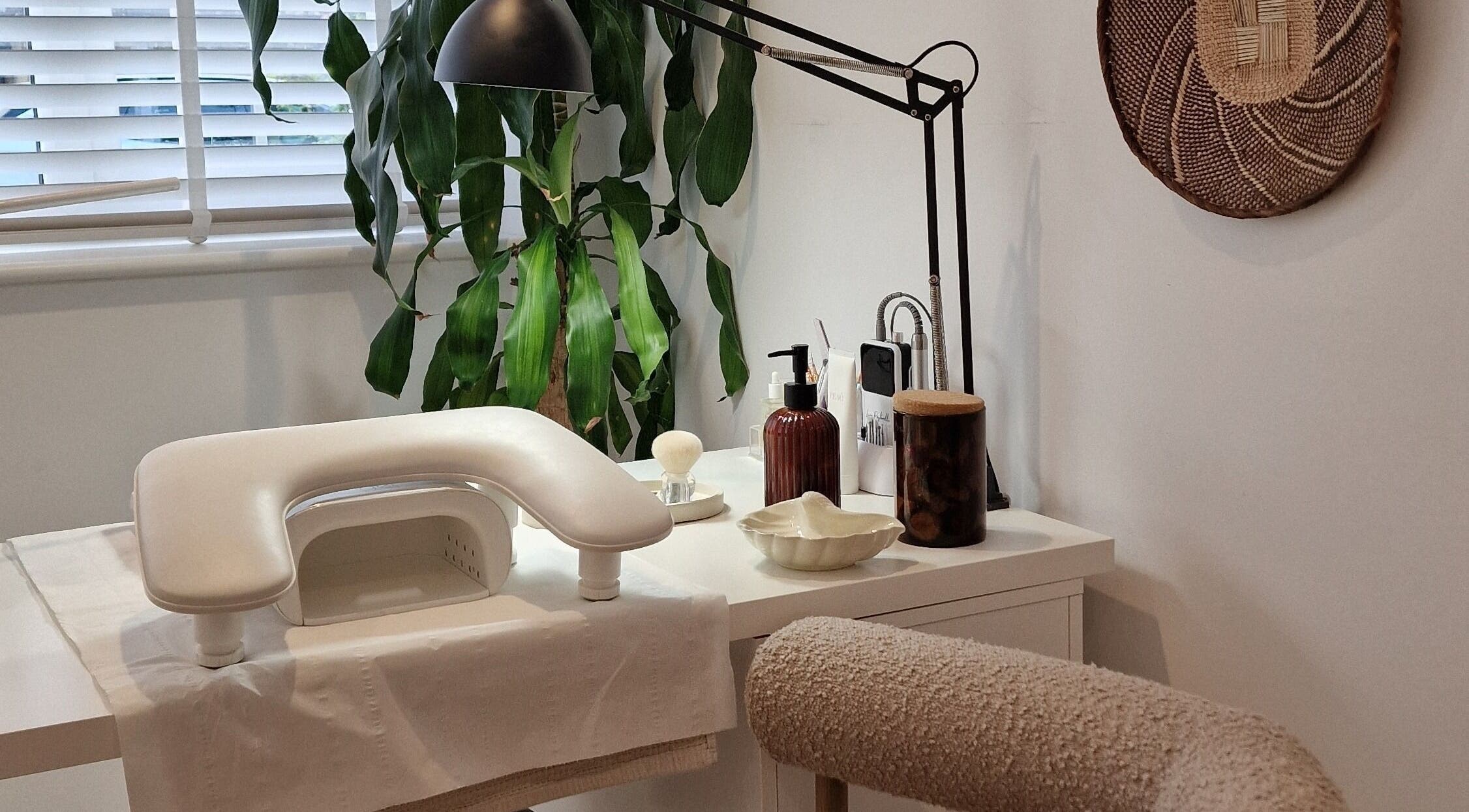 Manicure station at Klae Beauty, Camberley, England, GB with cozy decor and modern amenities.