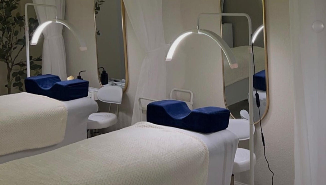 Elegant treatment room at Marose Aesthetics, Bradford, England, GB with soft lighting and modern decor.