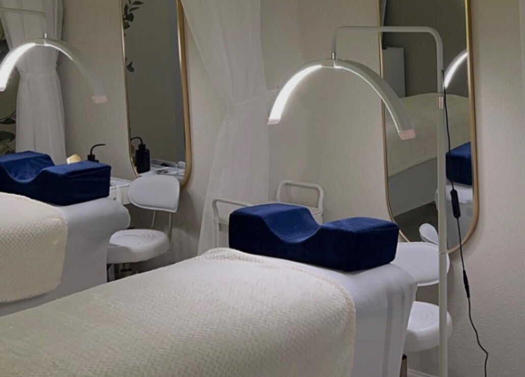 Elegant treatment room at Marose Aesthetics, Bradford, England, GB with soft lighting and modern decor.