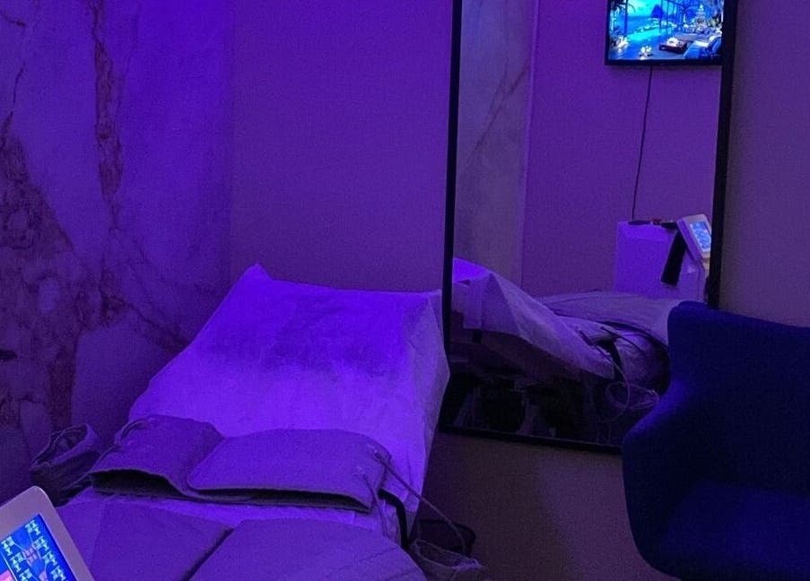 Relaxation room at Shape Zone London with purple lighting, located in London, England, GB.