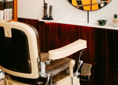 Cozy interior at Lume Hair Studio | Netil Lane, London, England, GB with vintage barber chair.