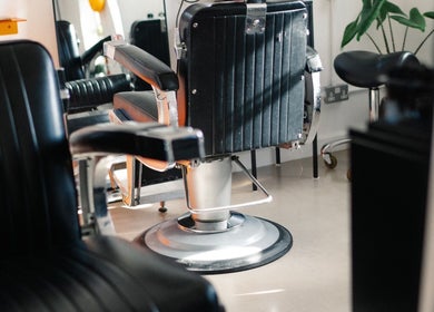 Modern salon chair at Lume Hair Studio | Netil Lane, London, England, GB, offering sleek styling services.