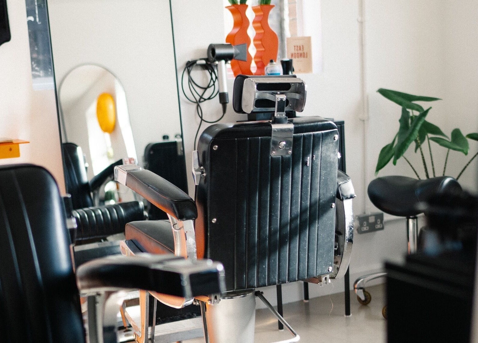 Stylish salon chair at Lume Hair Studio | Netil Lane, London, England, GB, enhancing a modern interior.
