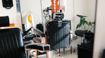 Stylish salon chair at Lume Hair Studio | Netil Lane, London, England, GB, enhancing a modern interior.