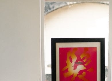 Colorful framed art piece at Lume Hair Studio | Netil Lane, London, England, GB highlighting creative decor.