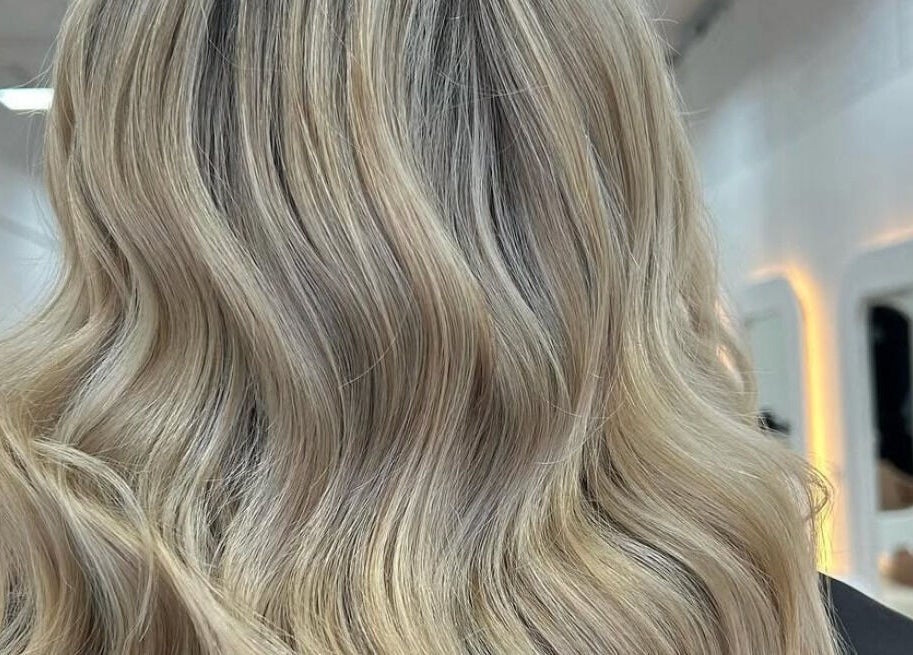 Stunning blonde waves styled at BIMBOS, Palm Beach, Queensland, AU. Perfect hair in a chic salon.