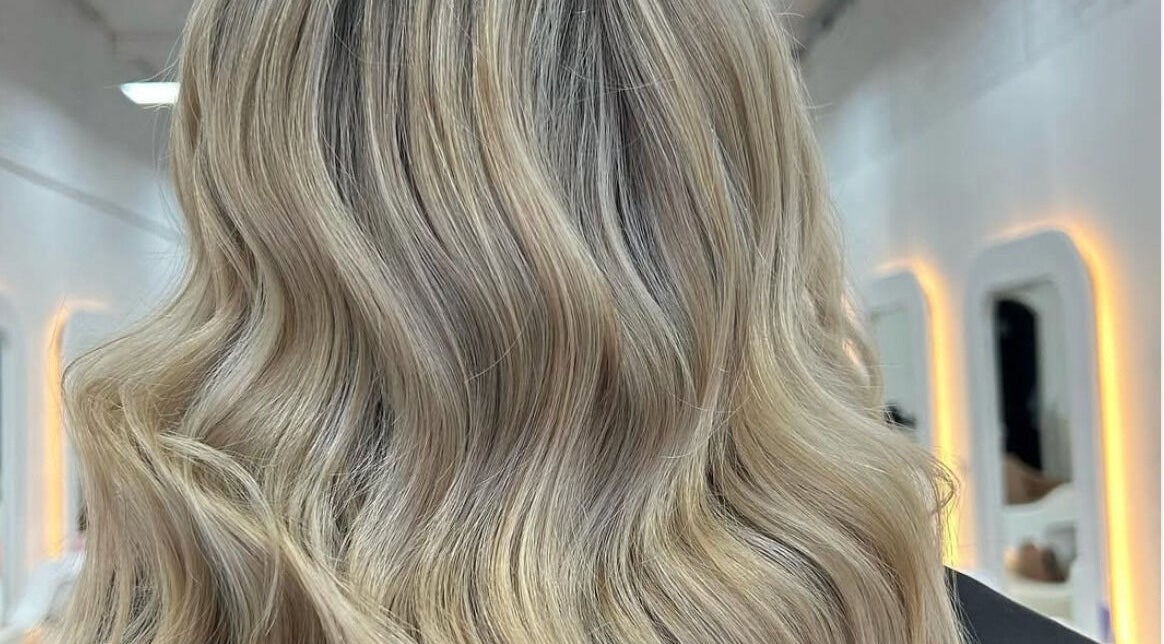Stunning blonde waves styled at BIMBOS, Palm Beach, Queensland, AU. Perfect hair in a chic salon.