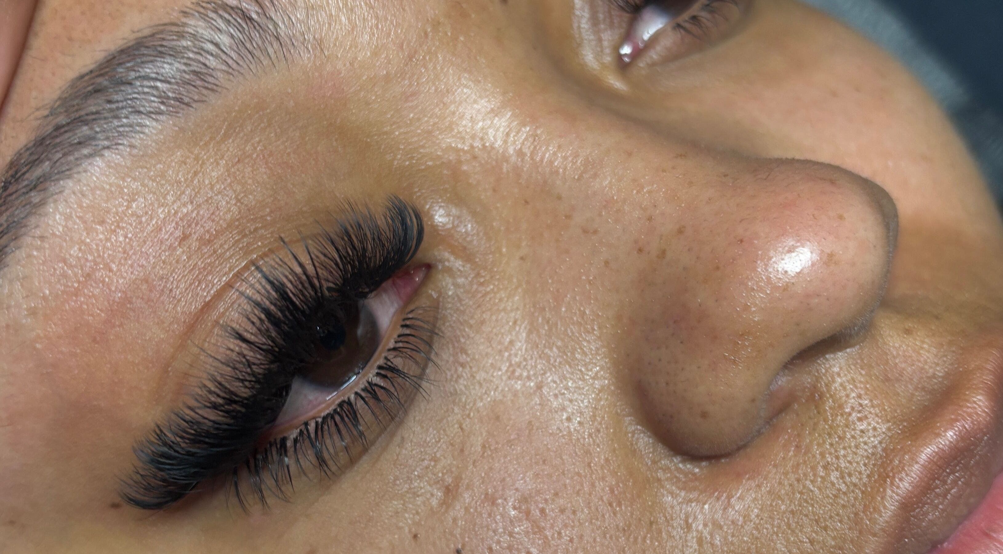 Close-up of lush eyelash extensions at LashedByValid, Brampton, Ontario, CA, showcasing expert beauty care.