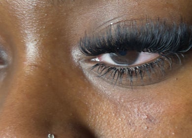 Close-up of eyelash extensions from LashedByValid in Brampton, Ontario, CA, showcasing detailed lash work.