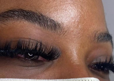Close-up of voluminous lashes done at LashedByValid, Brampton, Ontario, CA. Enhancing beauty with precision.