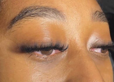 Close-up of lash extensions at LashedByValid, Brampton, Ontario, CA, showcasing professional artistry.