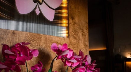 Elegant orchid decor at Serenity Zen Spa - West Covina, California, US enhancing the calming ambiance.