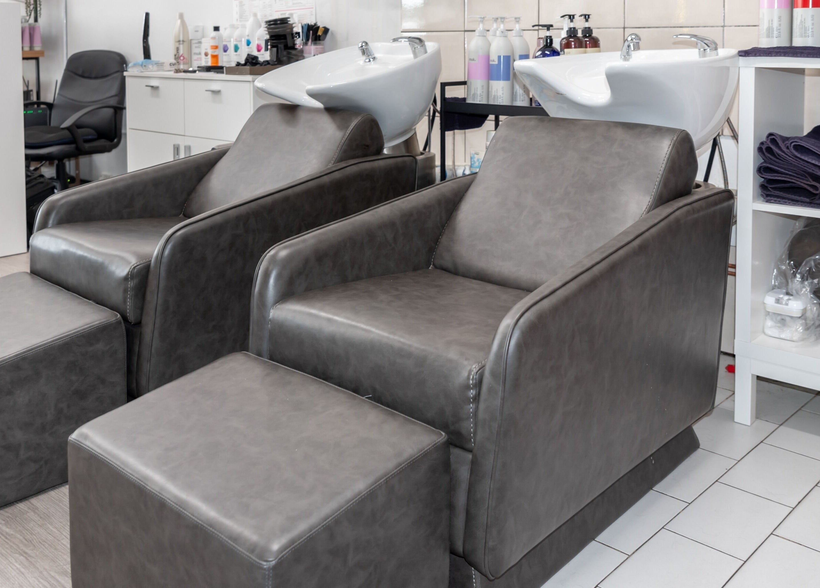 Modern wash stations at Adore Makeovers, Newton, South Australia, AU, offering luxury hair treatments.