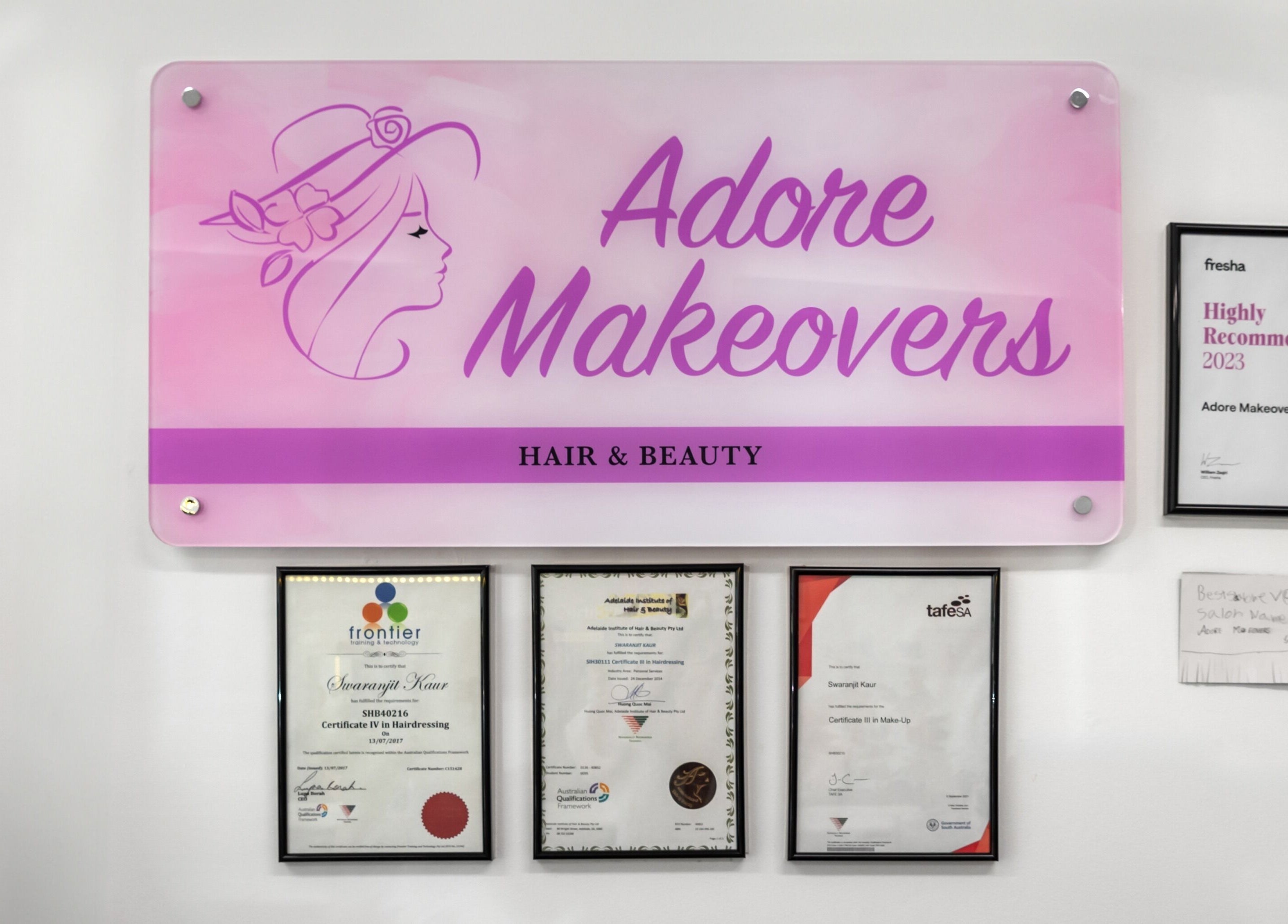 Adore Makeovers wall sign with certificates and awards in Newton, South Australia, AU.