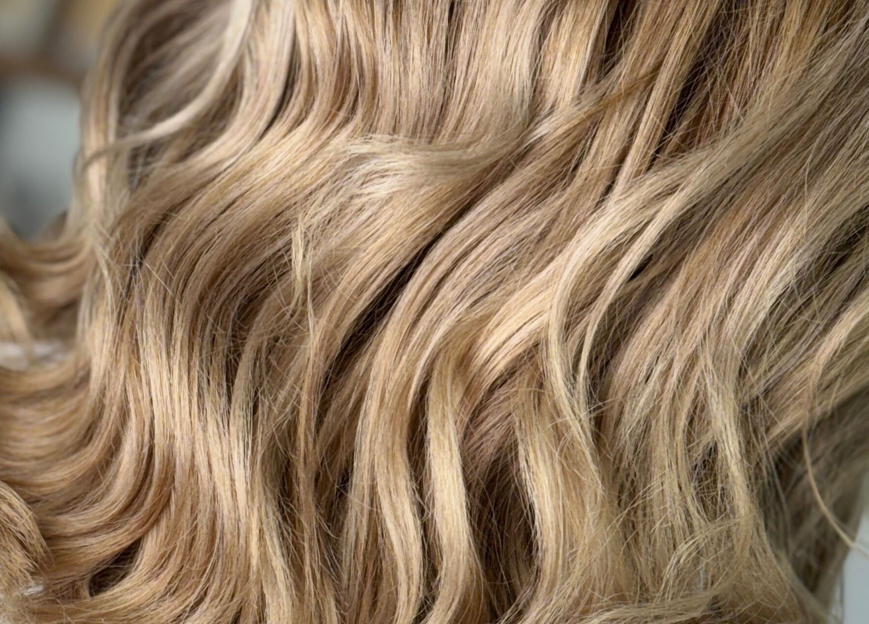 Beautiful wavy blonde hairstyle at Adore Makeovers, Newton, South Australia, AU.
