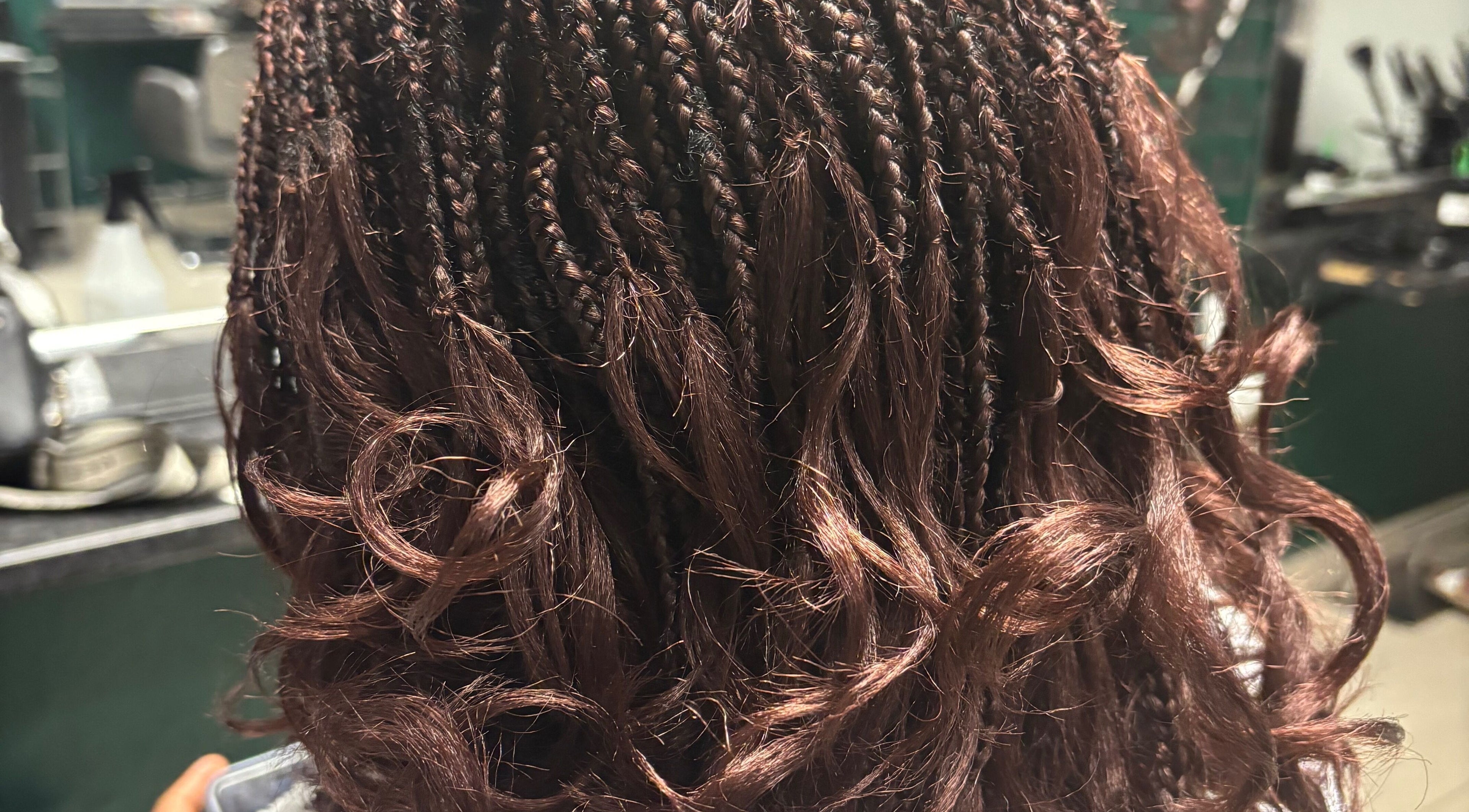 Intricate braids at Lotus Beauty Hair in Cape Town, Western Cape, ZA offering expert styling services.