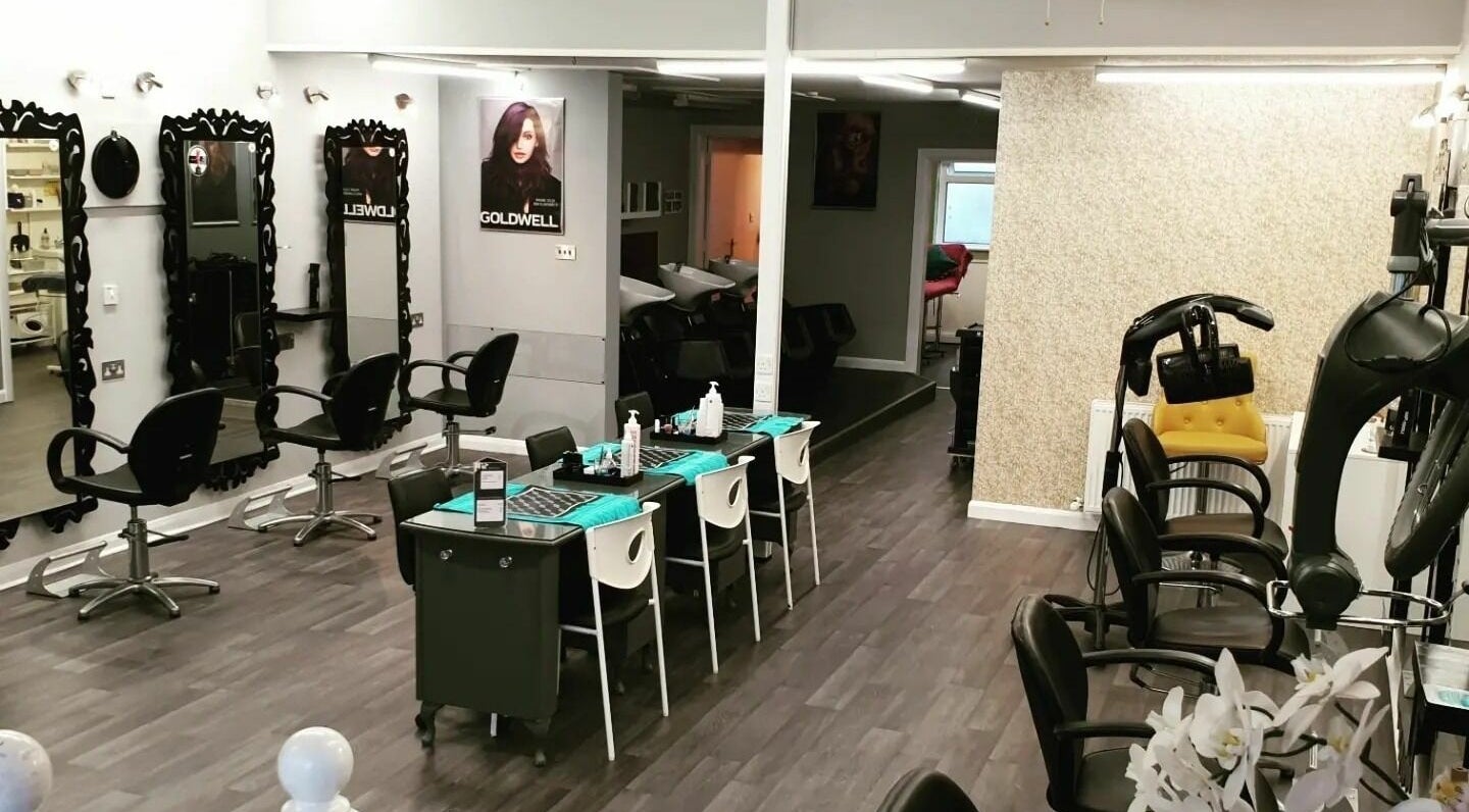 Elegant salon setup at No16 Hair and Beauty, Isle of Man, Port Erin, IM, showcasing modern styling stations.