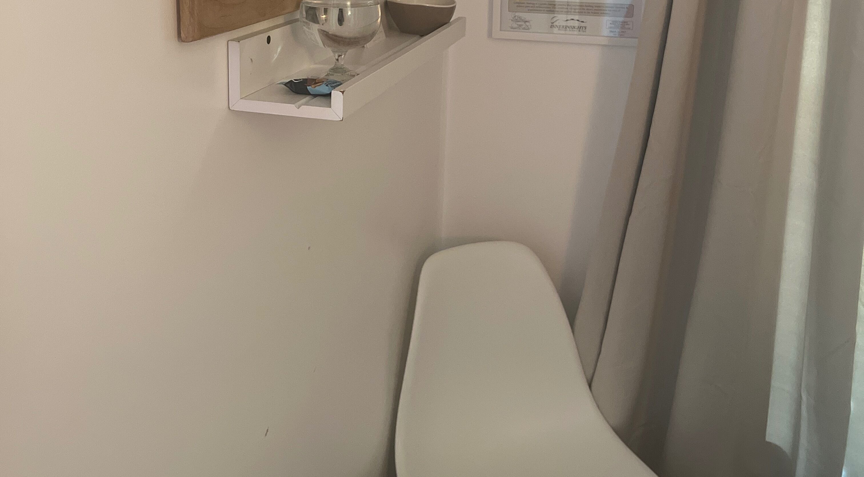 Tranquil waiting area at Eva B. Wiebe, CMP in Aylmer, ON, CA with seating and decor.