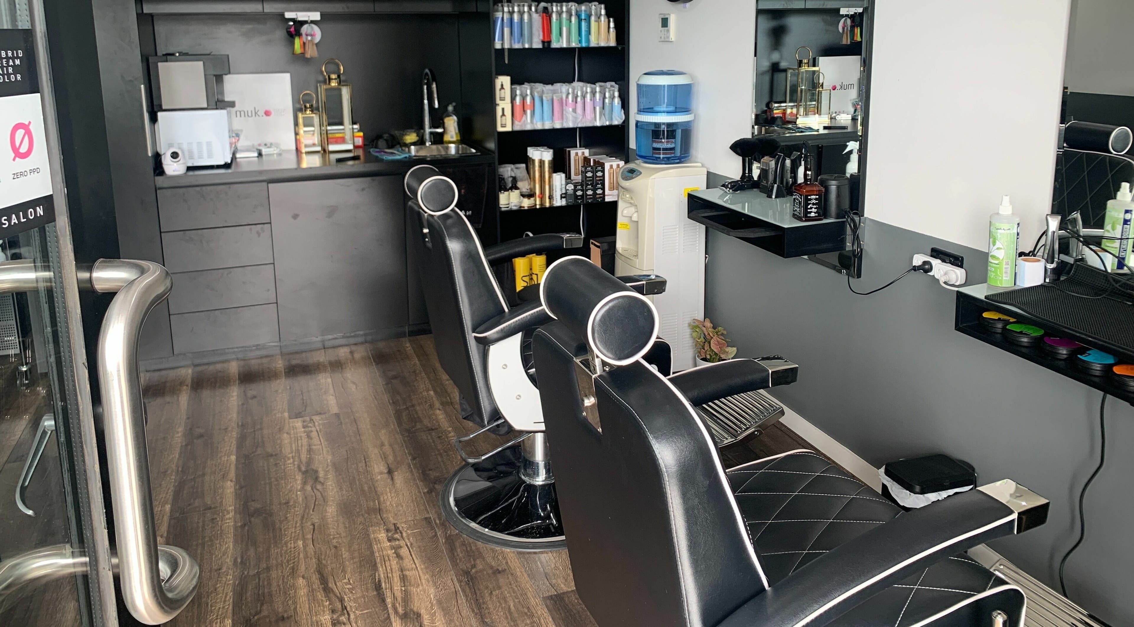 Modern interior of Darem Salon in Melbourne, Victoria, AU showcasing sleek styling chairs and equipment.