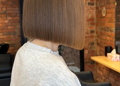 Sleek bob haircut at Hair by Coco Milk, Melbourne, Victoria, AU, showcasing modern salon style.