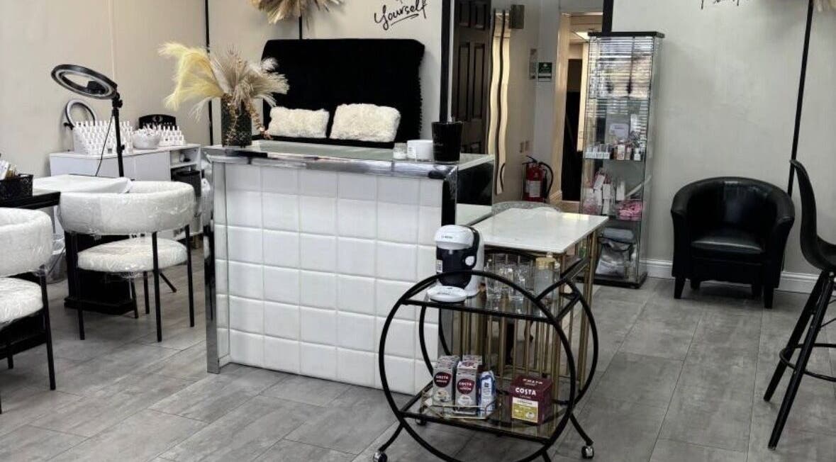 Modern interior of Tranquil beauty and wellness in Liverpool, England, GB with stylish décor and seating.