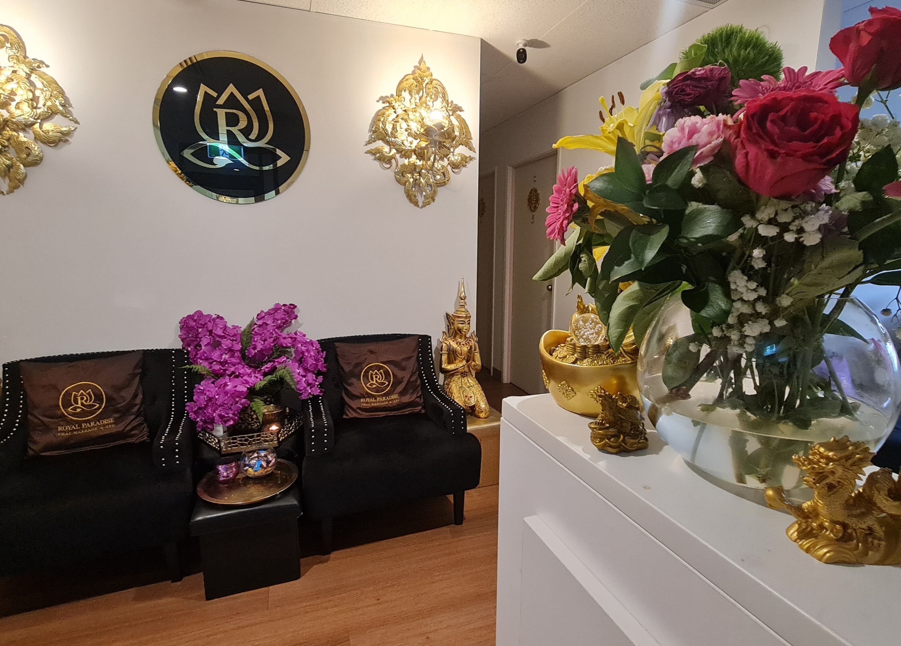Elegant seating and floral decor inside Royal Paradise Thai Massage and Remedial, Milton, Queensland, AU.