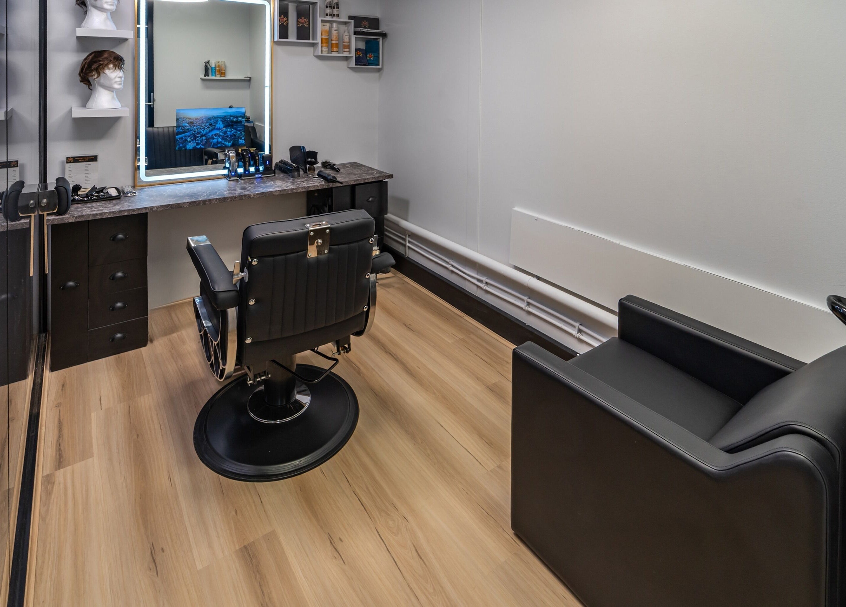 Modern barber chair at Gentlemen's Hair Lounge (Joondalup Branch) in Joondalup, Western Australia, AU.