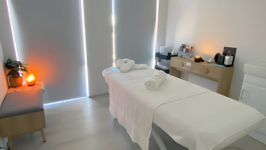 A tranquil spa room at Simply Skin and Beauty, Alkimos, Western Australia, AU, with a massage table and soft lighting.