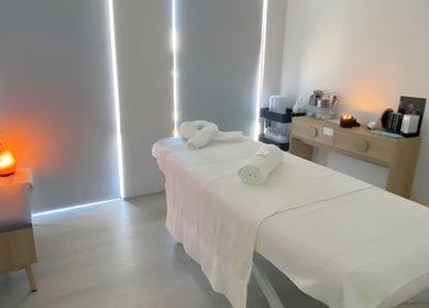A tranquil spa room at Simply Skin and Beauty, Alkimos, Western Australia, AU, with a massage table and soft lighting.