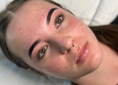 Close-up of a woman with flawless skin at Simply Skin and Beauty, Alkimos, Western Australia, AU.