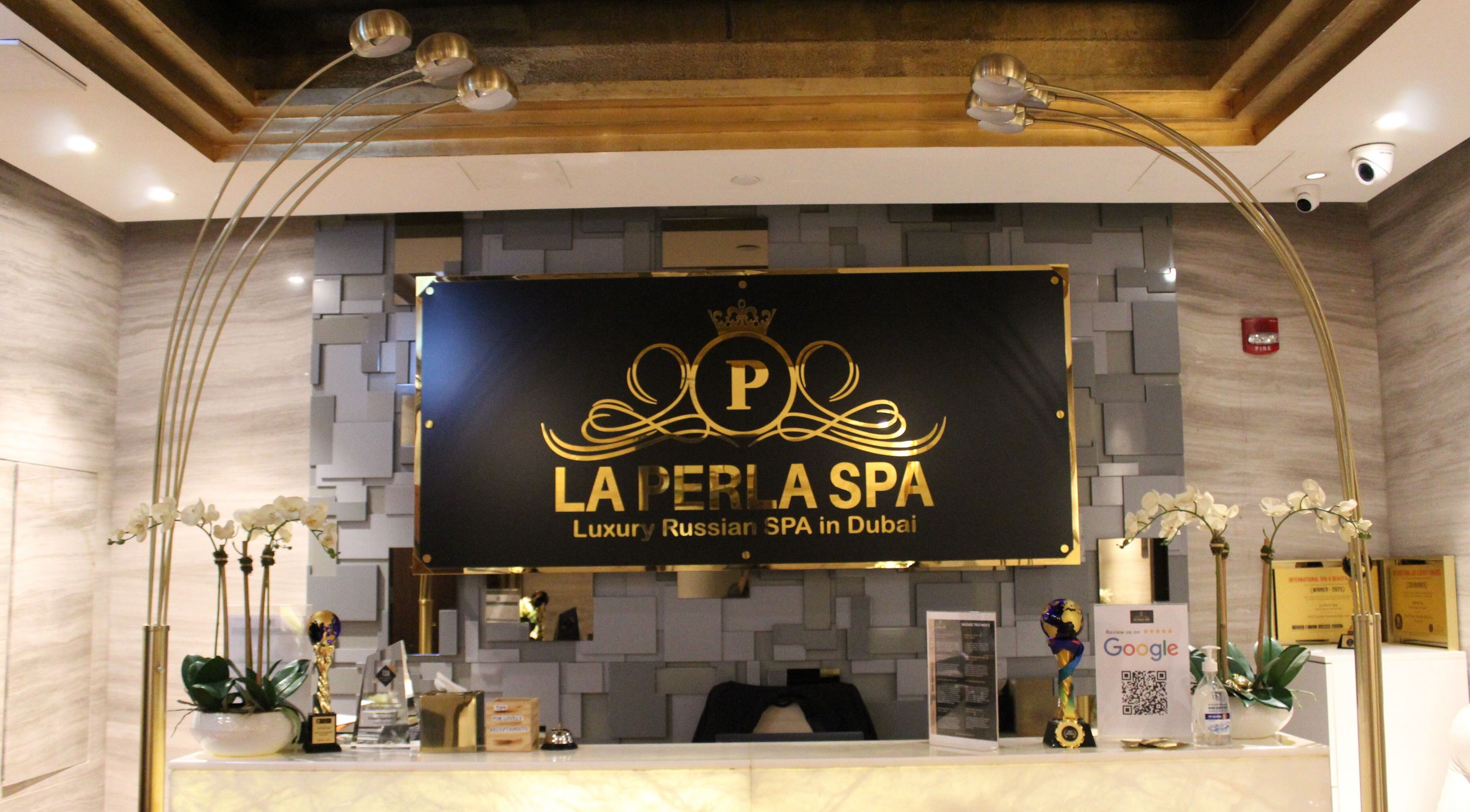 Reception area of La Perla Spa Dubai featuring luxurious decor at Dubai, Dubai, AE.
