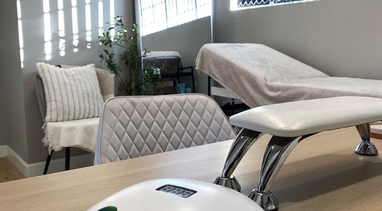 Elegant nail treatment room at Nails by Erika, Morley, England, GB with plush seating and modern decor.